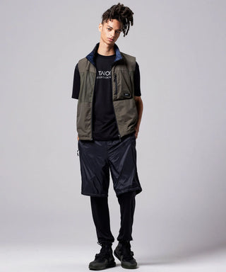 ダークオリーブ×ダークネイビー（表側）／モデル身長 181cm／着用サイズ L