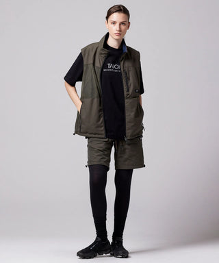 ダークオリーブ×ダークネイビー（表側）／モデル身長 169cm／着用サイズ XS